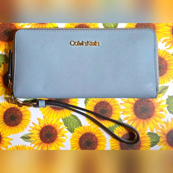 Calvin Klein Handbags - Calvin Klein Light Blue Wristlet